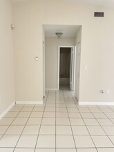 6045 NW 186th St, Unit 113 in Miami Gardens, FL - Building Photo - Building Photo