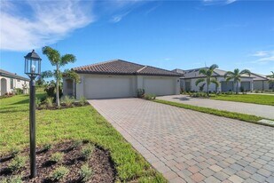 19592 Hinkley Dr in Estero, FL - Building Photo