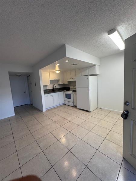 property at 6001 NW 7th St