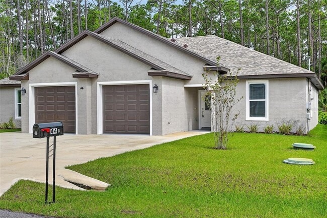 44 Regency Dr in Palm Coast, FL - Foto de edificio - Building Photo