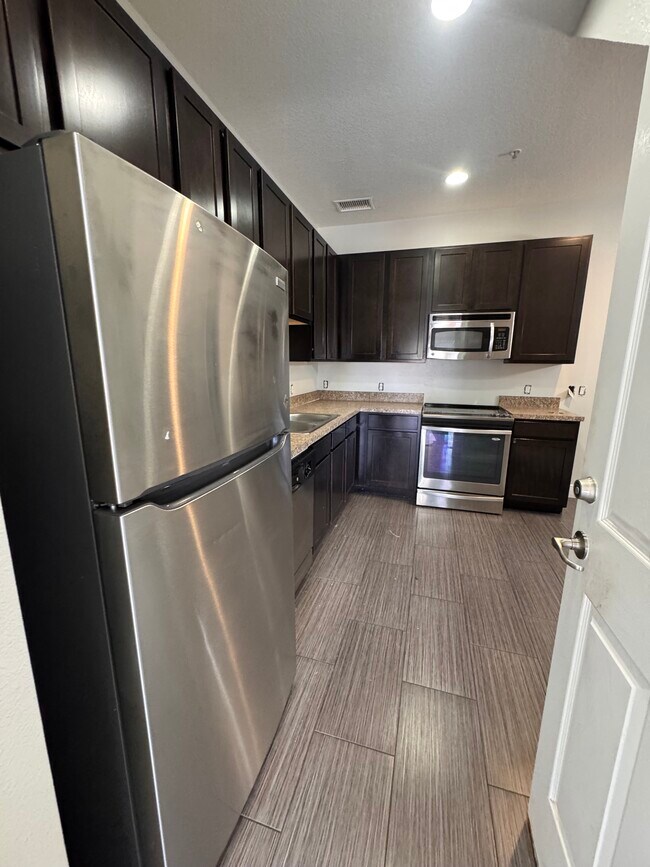 9635 Tivoli Villa Dr in Orlando, FL - Foto de edificio - Building Photo