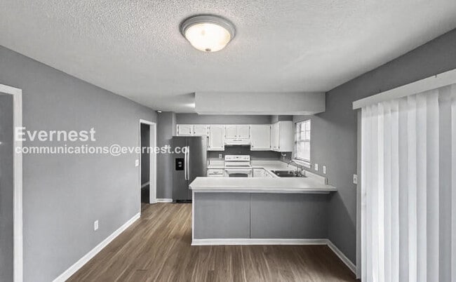 7012 Windcrest Ln in Harrison, TN - Foto de edificio - Building Photo