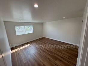5507-5509 S Manhattan Pl in Los Angeles, CA - Building Photo - Building Photo