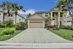 10442 NW 60th Pl in Parkland, FL - Building Photo