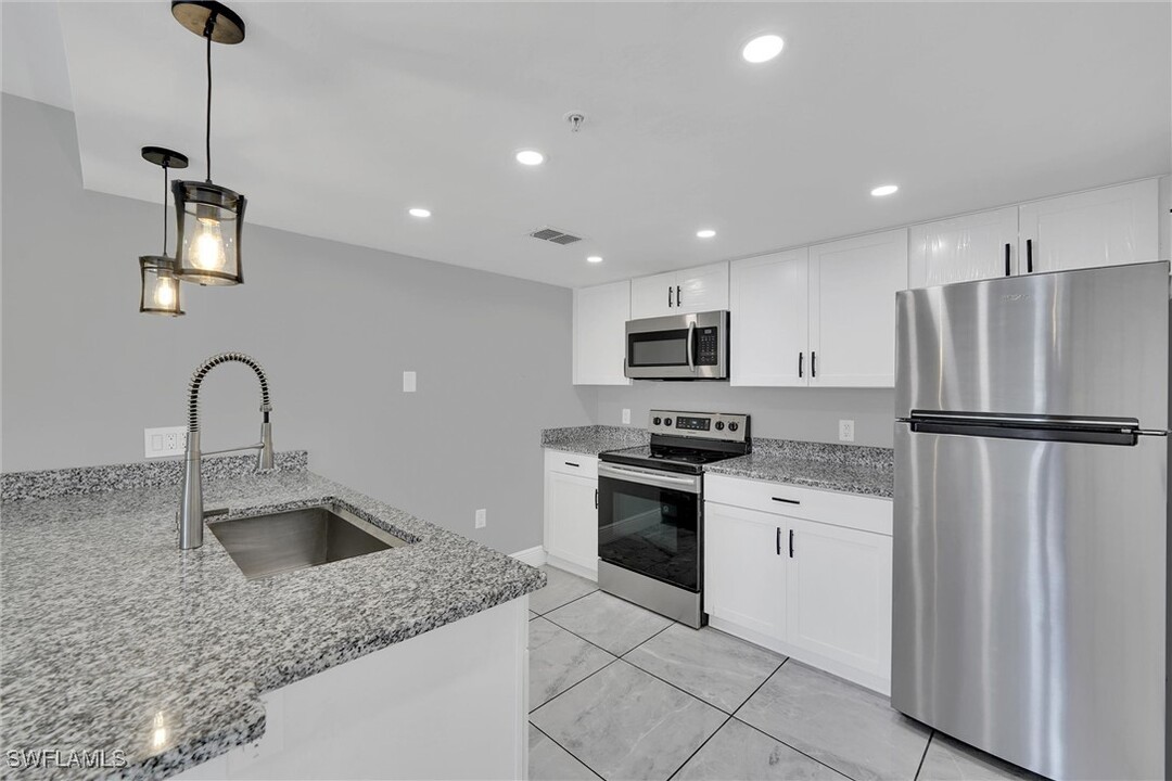1755 Four Mile Cove Pkwy in Cape Coral, FL - Building Photo