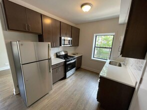 3407 W Fullerton Ave, Unit 3407-2C in Chicago, IL - Foto de edificio - Building Photo