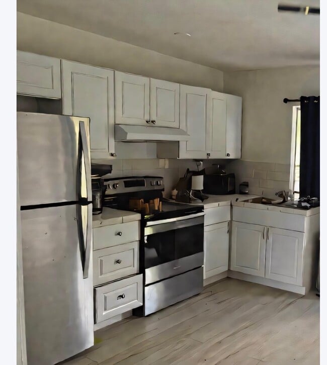 6013 NW 68th Terrace in Tamarac, FL - Foto de edificio - Building Photo