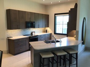 23097 E El Dorado Ave in Estero, FL - Building Photo - Building Photo