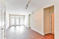Modern Style Olive Living Space - The Vyne on Central Apartments in Charlotte, North Carolina