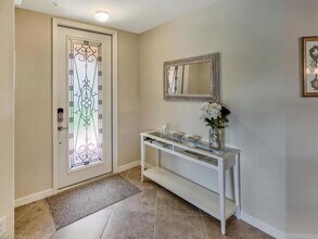 9114 Prima Way, Unit 102 in Naples, FL - Building Photo - Building Photo