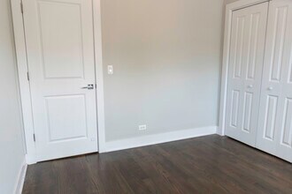 3921 N Janssen Ave, Unit 1E in Chicago, IL - Building Photo - Building Photo