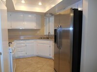 Kitchen with Appliances - Crown Point Apartments in Riverside, California