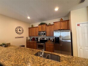 3075 Beach Palm Ave in Kissimmee, FL - Building Photo - Building Photo