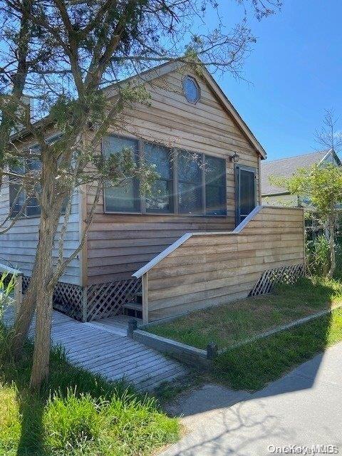 295 Cottage Walk in Ocean Beach, NY - Building Photo