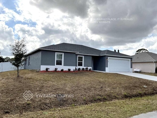 714 Munich St NW in Palm Bay, FL - Building Photo - Building Photo