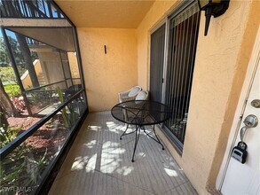 4031 Ice Castle Way, Unit 3303 in Naples, FL - Foto de edificio - Building Photo