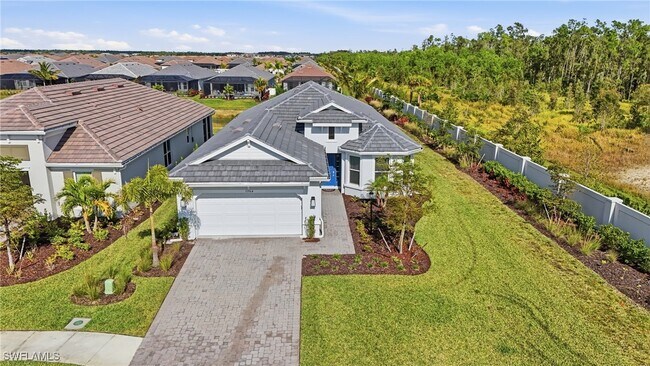 11964 Molto Dr in Miromar Lakes, FL - Building Photo - Building Photo