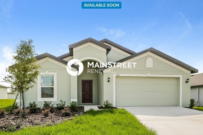 1682 Hideaway Flat St in Mascotte, FL - Building Photo