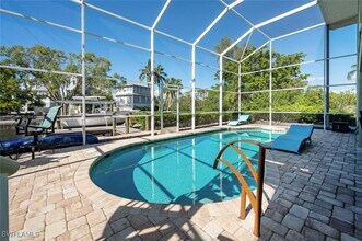 3858 Riviera Cir in Bonita Springs, FL - Building Photo - Building Photo