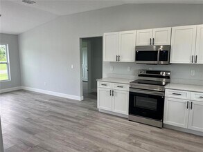 7209 Ancha St in Sebring, FL - Foto de edificio - Building Photo