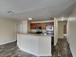 1385 Dean St, Unit 2E in Mulberry, FL - Building Photo - Building Photo