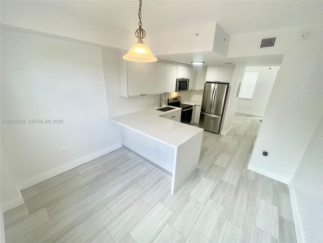 property at 77 E 4th St