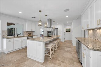 718 Old Trail Dr in Naples, FL - Building Photo - Building Photo