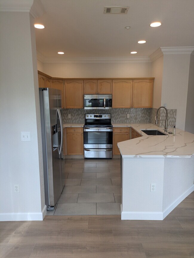 9390 W Chatfield Pl, Unit 107 in Littleton, CO - Building Photo - Building Photo