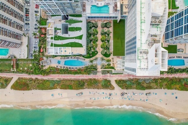 property at 6899 Collins Ave