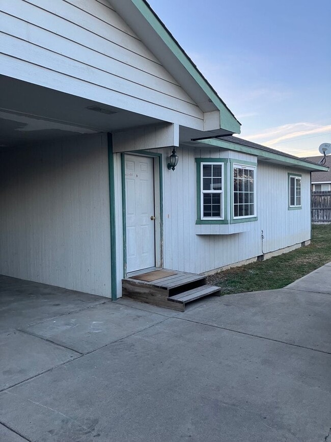 property at 903 E White Birch Ave