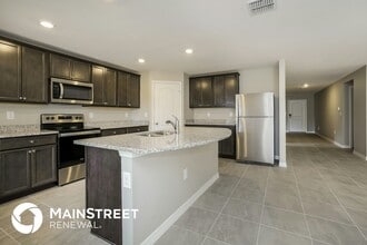 1698 Hideaway Flat St in Mascotte, FL - Building Photo - Building Photo