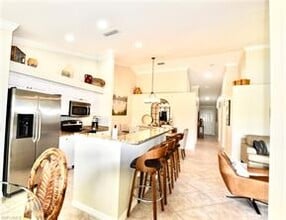 20000 Barletta Ln-Unit -722 in Estero, FL - Foto de edificio - Building Photo