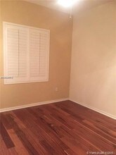 1640 Presidential Way-Unit -205 in West Palm Beach, FL - Building Photo - Building Photo