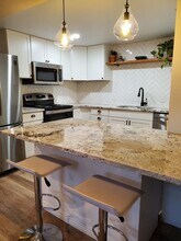 7722 Saulsbury St, Unit Lower in Arvada, CO - Building Photo - Building Photo