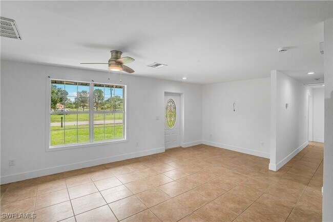 803 Monroe Dr in Lehigh Acres, FL - Building Photo - Building Photo