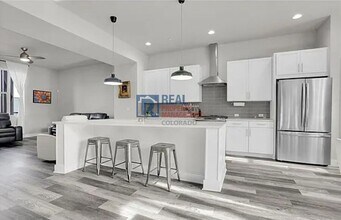 7040 W Alaska Dr in Lakewood, CO - Building Photo - Building Photo