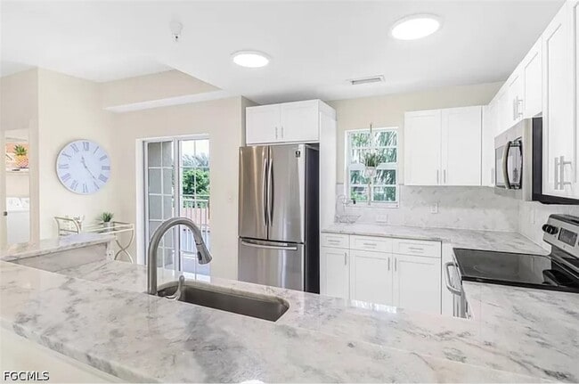 4450 Botanical Pl Cir, Unit 6 in Naples, FL - Foto de edificio - Building Photo