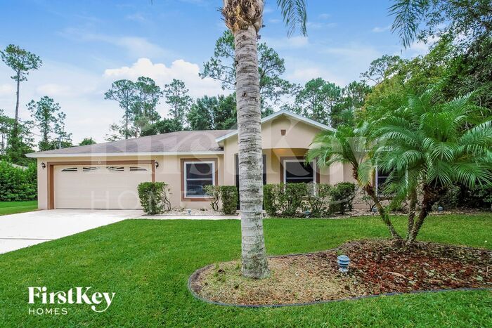 15 Rymen Ln in Palm Coast, FL - Building Photo