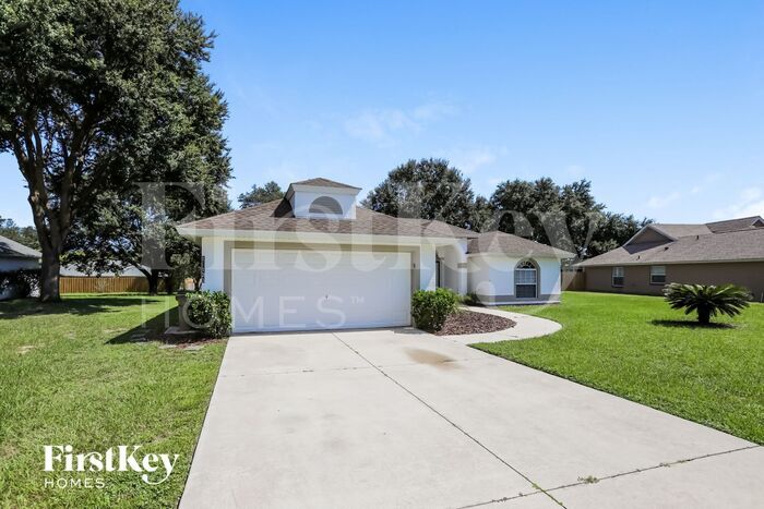 14123 Winterdale Dr in Grand Island, FL - Building Photo