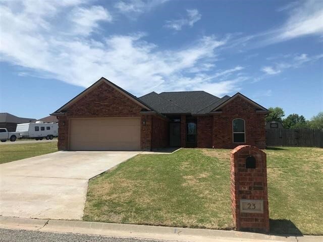 property at 23 NE Summerwood Dr