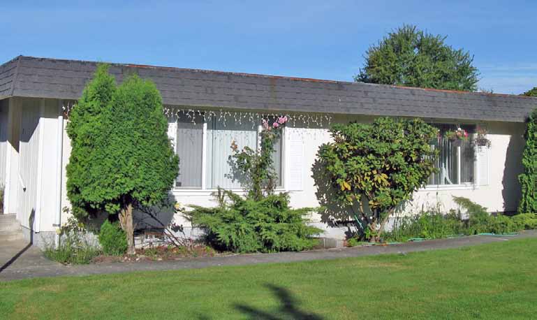 1218 W Main Apartments in Puyallup, WA - Building Photo