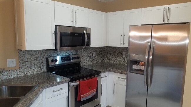 property at 4716 SW 13th Ct