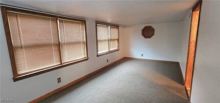 9090 Radcliffe Rd in Adamsville, OH - Building Photo - Building Photo