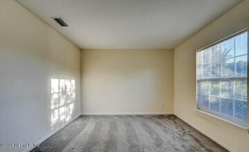 8648 Floorstone Mill Dr in Jacksonville, FL - Building Photo - Building Photo