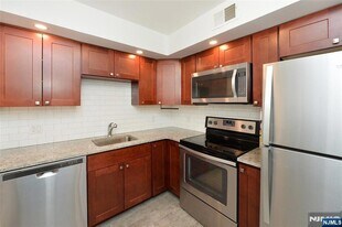 20-30-30 Ridge Rd, Unit A8 in Ridgewood, NJ - Building Photo