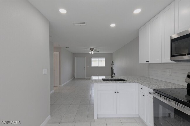 property at 427 NE Pine Island Ln