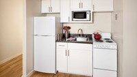 Kitchen with Hard Surface Flooring - 1500 Mass Apartments in Washington, District of Columbia