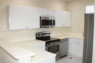 4704 NW 57th Pl in Coconut Creek, FL - Building Photo - Building Photo