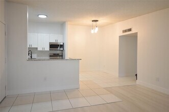 9499 W McNab Rd in Tamarac, FL - Building Photo - Building Photo