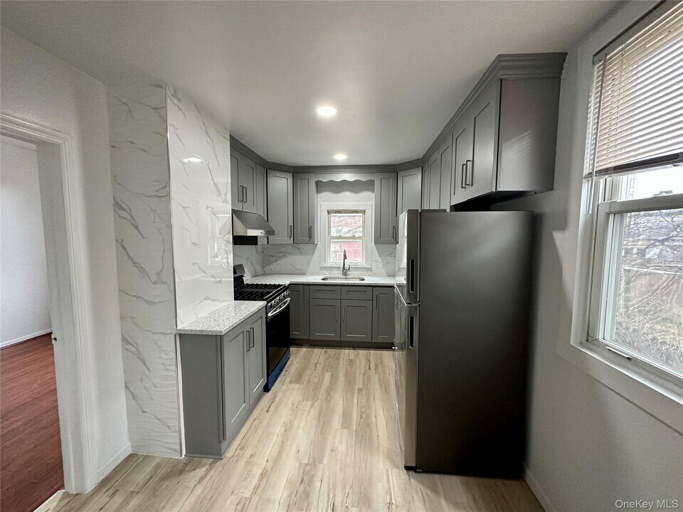 22-28-28 126th St in Queens, NY - Building Photo